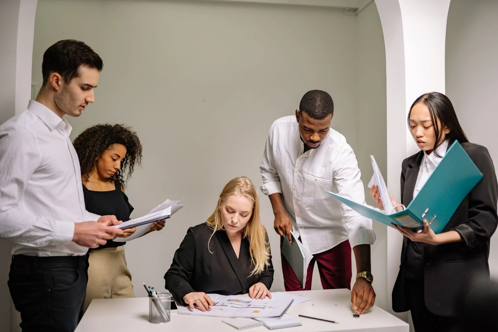 A diverse community team collaborating on a shared project