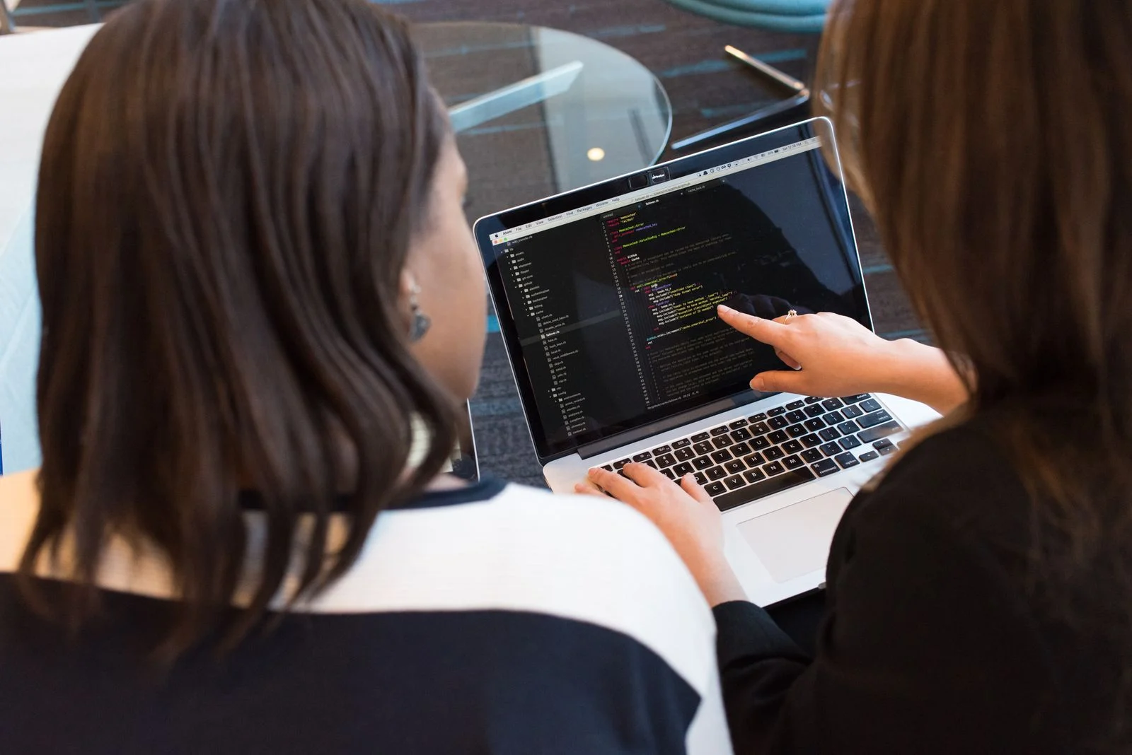 Women collaborating on software and digital technology